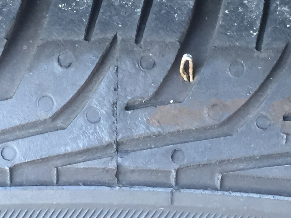 Nail in car tire